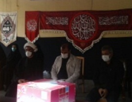 برگزاری موکب عزاداری اربعین حسینی همراه با توزیع ماسک و مواد ضدعفونی کننده
