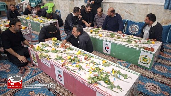 وداع با پیکر ۹ شهید پدافند سیراف در کنگان وداع با پیکر ۹ شهید پدافند سیراف در کنگان
