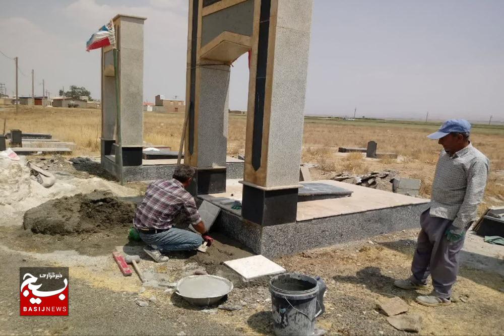 مرمت و بازسازی مزار شهدای روستای آهوتپه توسط بسیج سازندگی اسدآباد