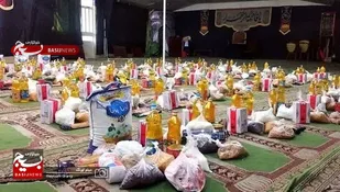 تهیه و توزیع بسته های معیشتی توسط بسیجیان ناحیه مقاومت بسیج کربلا