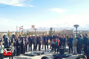 غبارروبی و عطرافشانی مزار شهدای روستای بهادربیگ