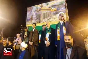 پرچم متبرک رضوی زینت&zwnj;بخش پنجاه&zwnj;وپنجمین شب اجتماع ولایی تویسرکان