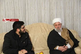 حجت الاسلام نعیمی از خانواده شهید احمدی روشن بازدید کرد
