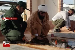 مراسم غبارروبی مزار شهدای روستای شیخیان باغ پیر شهرستان دشتی
