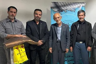 دیدار مسئولان دفتر حمایت حقوقی و قضایی ایثارگران همدان با خانواده شهدا