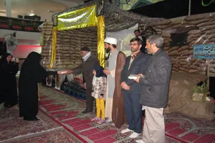 تکریم مادران و همسران شهدا در شهرک ولیعصر(عج) همدان