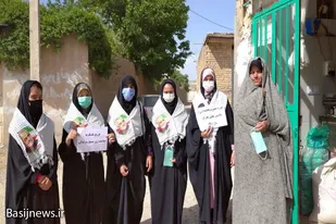 توزیع ماسک توسط گروه جهادی شهید خواستان فامنین