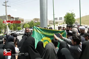 اهتزاز پرچم امام رضا(ع) در میدان سیدالشهداء نهاوند