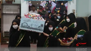 ادای احترام دانش آموزان قمی به پیکر شهید گمنام