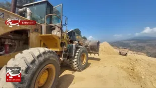 اجرای احداث جاده بین مزارع در روستای بیشه بنه هزارجریب بهشهر