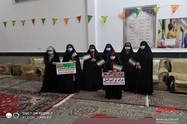 طنین بانگ الله اکبر و اهتزار پرچم جمهوری اسلامی ایران توسط خواهران بسیجی حوزه ام الائمه