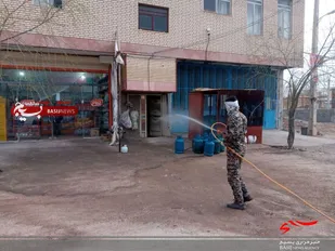 گندزدایی و ضدعفونی مراکز عمومی شهرستان دهاقان توسط جهادگران بسیجی