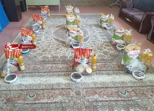تهیه وتوزیع بسته های معیشتی و کمک مؤمنانه به مناسبت عید فطر