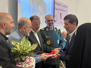 تجلیل از خانواده شهید مصطفی غریب شیرنگی در تهران