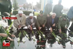 عطرافشانی گلزار شهدای گمنام امام زاده عبدالله (ع) ملایر