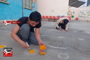 جهادگران بسیجی اقدام به رنگ آمیزی مدارس سرخه کردند
