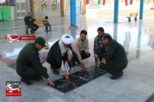غبارروبی وعطرافشانی مزارشهدا درشوشتر