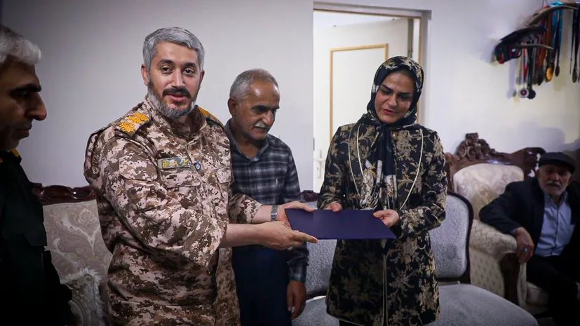 تجلیل سپاه کربلا از خانواده قهرمانان کشتی جهان در آمل