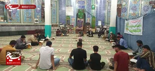 برپایی محفل انس با قرآن توسط بسیجیان گردان امام حسین (ع) بندر امام خمینی(ره)