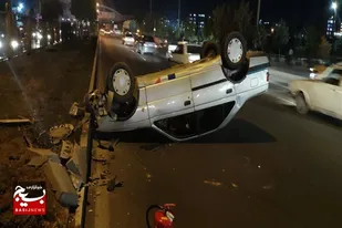 واژگونی خودرو پژو بعد از زیرگذر صدا و سیمای همدان