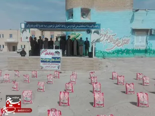 رزمایش توزیع ۵۰۰ بسته کمک مومنانه در آغاجاری