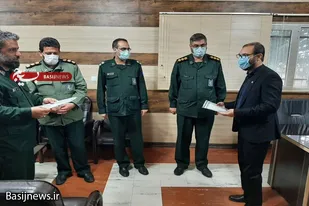 تجلیل از خبرنگاران افتخاری خبرگزاری بسیج در اسدآباد