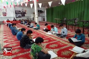 برگزاری محفل انس با قرآن کریم در محله کرامت محمودبیگی اسدآباد