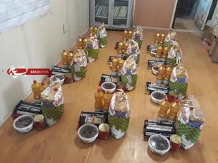 تهیه و توزیع بسته معیشتی بین نیازمندان به همت رزمندگان و بسیجیان گردان ۱۱۲ امام حسین)علیه السلام)