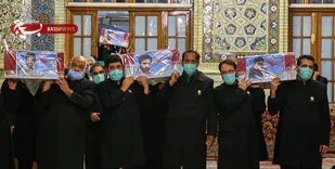 طواف و اقامه نماز بر &laquo;شهدای خان طومان&raquo; در حرم مطهر رضوی/ بدرقه از معراج شهدای مشهد +فیلم و عکس