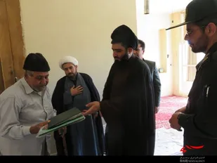 ديدار با خانواده شهيدان نادری و پير محمدی در شهرستان بن