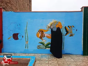 یک باب مدرسه پسرانه در جمکران با رنگ&zwnj;آمیزی به استقبال سال نو رفت