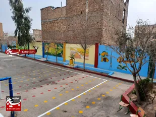 رنگ&zwnj;آمیزی  مدرسه&zwnj;ای در منطقه جمکران توسط گروه جهادی مکتب عاشورا