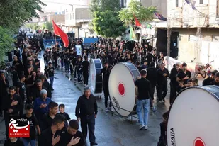 مراسم عزاداری تاسوعای حسینی در مهاجران