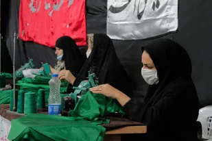 فعالیت کارگاه دوخت لباس شیرخوارگان حسینی