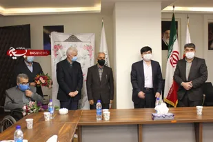 تجلیل از خانواده شهدای مدافع حرم در فدراسیون کشتی