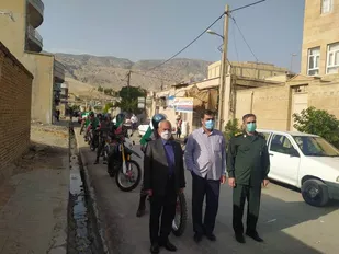 برگزاری رژه موتوری از درب منزل پدر شهید هسته ای داریوش رضایی نژاد تا گلزار شهداء شهرستان آبدانان