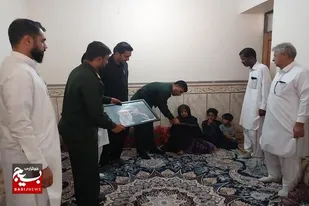 دیدار کارکنان سپاه  و معلمان قصرقند با خانواده شهید اسماعیل نوکری