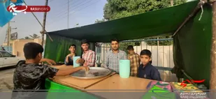 توزیع شربت و شیرینی به مناسبت فرارسیدن عید غدیر در موکب غدیر با همکاری مردم،پرسنل سپاه فاریاب و بسیجیان