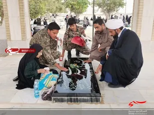 غبار روبی گلزار شهدا شهر دلوار در هفته عقیدتی سیاسی