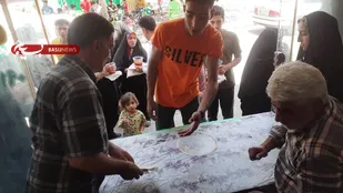 انجام اطعام غدیری در روستای چاه شیرین میامی+ فیلم