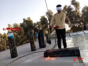 اردوی جهادی ایزوگام پشت بام منزل محروم  در خوروبیابانک