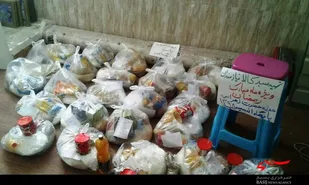 تهیه 35 سبد کالا و توزیع آن به همت بسیجیان پایگاه انسیه همدان