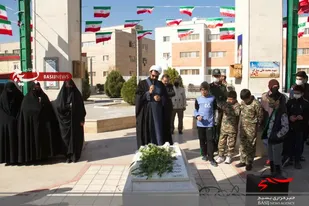 مراسم غبار روبی مزار شهدای مدفون در پردیسان