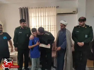 تجلیل از قهرمان کشتی دهه نودی در عباس آباد