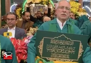 خادمان حرم رضوی، ضریح حرم امام حسین (ع) را گل&zwnj;آرایی کردند
