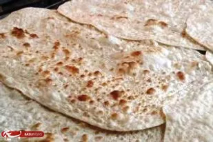پخت و توزیع رایگان نان با همت بسیجیان شهر جونقان