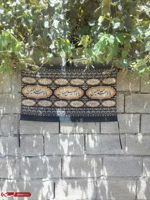 توزیع پرچم های عاشورائی در بازفت