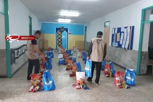 توزیع بسته های معیشتی توسط بسیج مهندسی عمران بهشهر