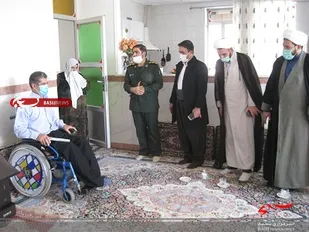 دیدار مسئولین جوانرود با خانواده جانباز 70درصد