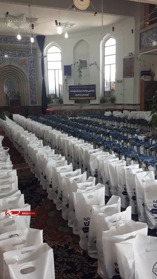 توزیع ۱۲۰۰ بسته معیشتی عیدانه در شاهرود + تصاویر